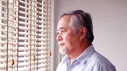 Senior man looking to outside with boring emotion. Stock Footage