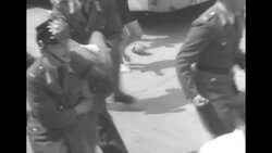 Crowd in West Berlin celebrates last year's anti-communist uprising but celebratory atmosphere is dampened when celebrants beat communists News Clip