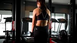 Young muscular woman doing heavy deadlift exercise at gym,  lifestyle sport and bodybuilding concept Stock Footage