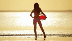 African American Asian Chinese girls on tropical beach Stock Footage