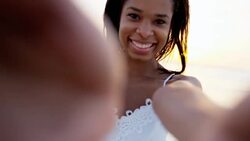 Portrait of African American female on ocean beach Stock Footage