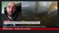 Ukrainian doctor says GPs learning combat medicine News Clip