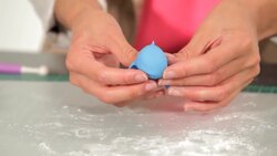 How to Make a Fondant Dolphin for a Beach Theme Cake Instructional Video
