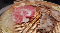 Grill pork , Close up of Meat grilled on brass pan. Stock Footage