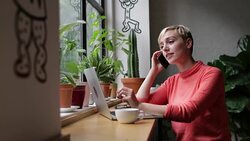 Freelance businesswoman working in a cafe Stock Footage
