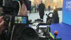 TV camera waiting for arrivals at NATO summit News Clip