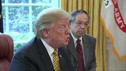 Trump says Herman Cain 'the man' for Fed board News Clip