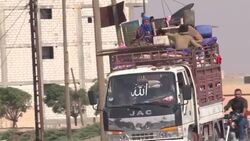 CLEAN : Residents of Syria border town Ras al-Ain flee Turkish offensive News Clip