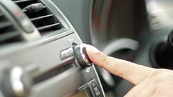Press the car audio button. Stock Footage