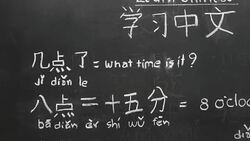 Learning chinese to tell time in class room. Stock Footage