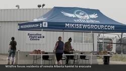 Dramatic evacuations in Fort Chipewyan as Alberta wildfires rage News Clip