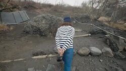 Young female tourist admiring Mt.Fuji's mossy landscape Stock Footage