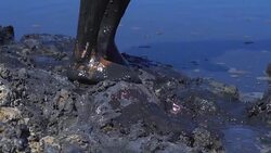 a girl smeared with mud Stock Footage