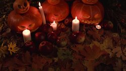 large and small pumpkins with carved faces. Halloween. Stock Footage
