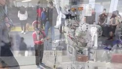 CLEAN : US: Boston residents play with robots at 'Robot Block Party' News Clip