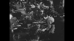 World War II British propaganda film: assembling rifles News Clip