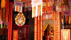 Buddhist traditional statues of chinese sacred gods on the altar inside the temple Stock Footage