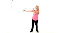 How to Do a Hula Hoop Across the Back Roll Instructional Video