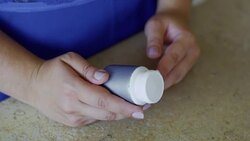 Fat girl holds pills in hands Stock Footage