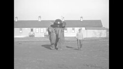 Animal trainer training elephant in winter quarters of Hagenbeck-Wallace Circus in Peru, IN News Clip