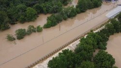 CLEAN : AERIAL SHOTS of homes submerged under flood waters in Kentucky News Clip