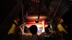 Craftsman working on huge old wooden brocade weaving looms Stock Footage