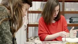 Women learning pottery in workshop Stock Footage