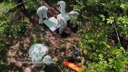 Ukrainian troops retrieve Russia's dead soldiers News Clip