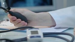 Measure blood pressure. Blood pressure check. Nurse hand measuring pressure Stock Footage