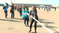 Plane Pull at O'Hare Raises Funds for Special Olympics Illinois Stock Footage