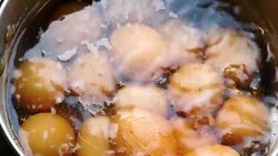 Eggs boiling in a pot. Stock Footage