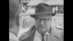 1960s: Reporter interviews people on the street Stock Footage