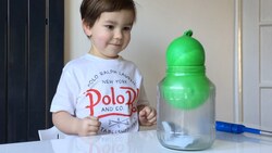 How to Suck a Water Balloon into a Bottle Instructional Video