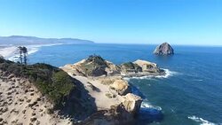 Pacific Ocean cliff Haystack Rock Stock Footage