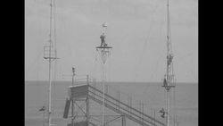 On pier in Atlantic City, NJ, acrobats Bob and Laura Top perform roller skating stunts News Clip