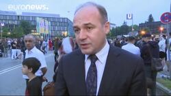 Mourners pay respects at scene of Munich shooting rampage News Clip