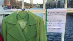 Warm for Winter coat charity hang items on Ha'penny Bridge News Clip