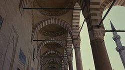 UP ANGLE OF STRIPED POINTED ARCHES AND CEILING. COULD BE SULEYMANIYE MOSQUE. ISLAMIC ARCHITECTURE. Stock Footage