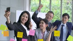 Asian Business Team Taking Selfie In Office Stock Footage