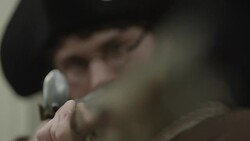 Young Revolutionary War soldier aiming musket Stock Footage