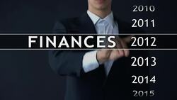 Businessman selects 2016 finances report on virtual screen, money statistics Stock Footage