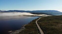 Aerial view. Road crossing Hardangervidda  plateau, Norway Stock Footage