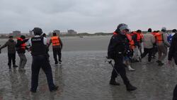 French police spray migrants looking to cross English Channel News Clip