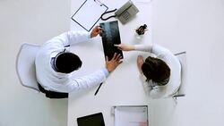 woman patient and doctor with spine x-ray scan Stock Footage