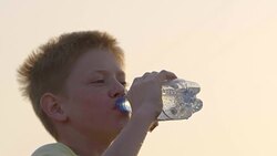 Boy is drinking soda. Stock Footage