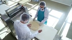 Food Production Workers Making Dough Stock Footage
