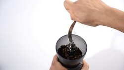 Hand rolling Coffee grinder to make Fresh coffee powder Stock Footage