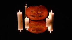 Pumpkin and candles. Halloween. Stock Footage