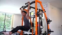 Young Asian handsome man doing exercises in gym Stock Footage