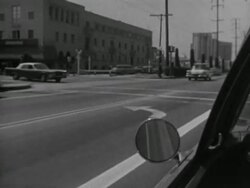 1965: POV Man driving convertible Instructional Video